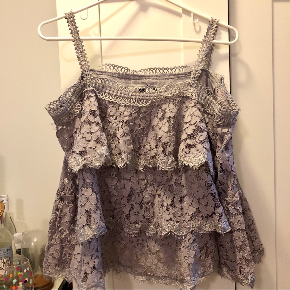 Beautifully detailed lace cold shoulder bell top